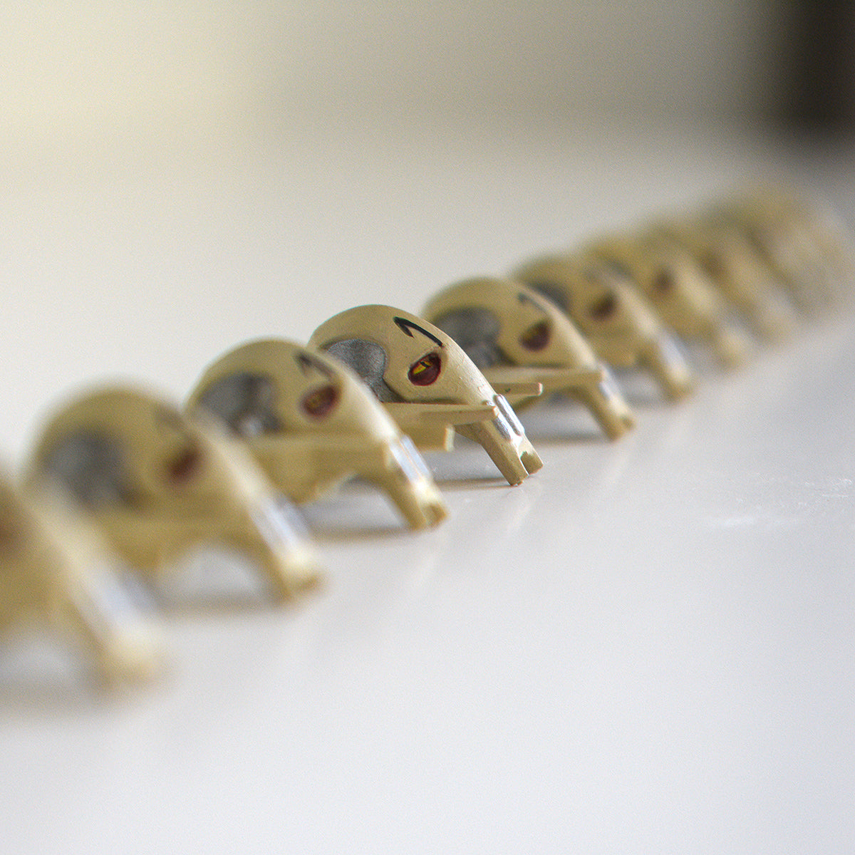 several copies of general grievous lego figures on the table