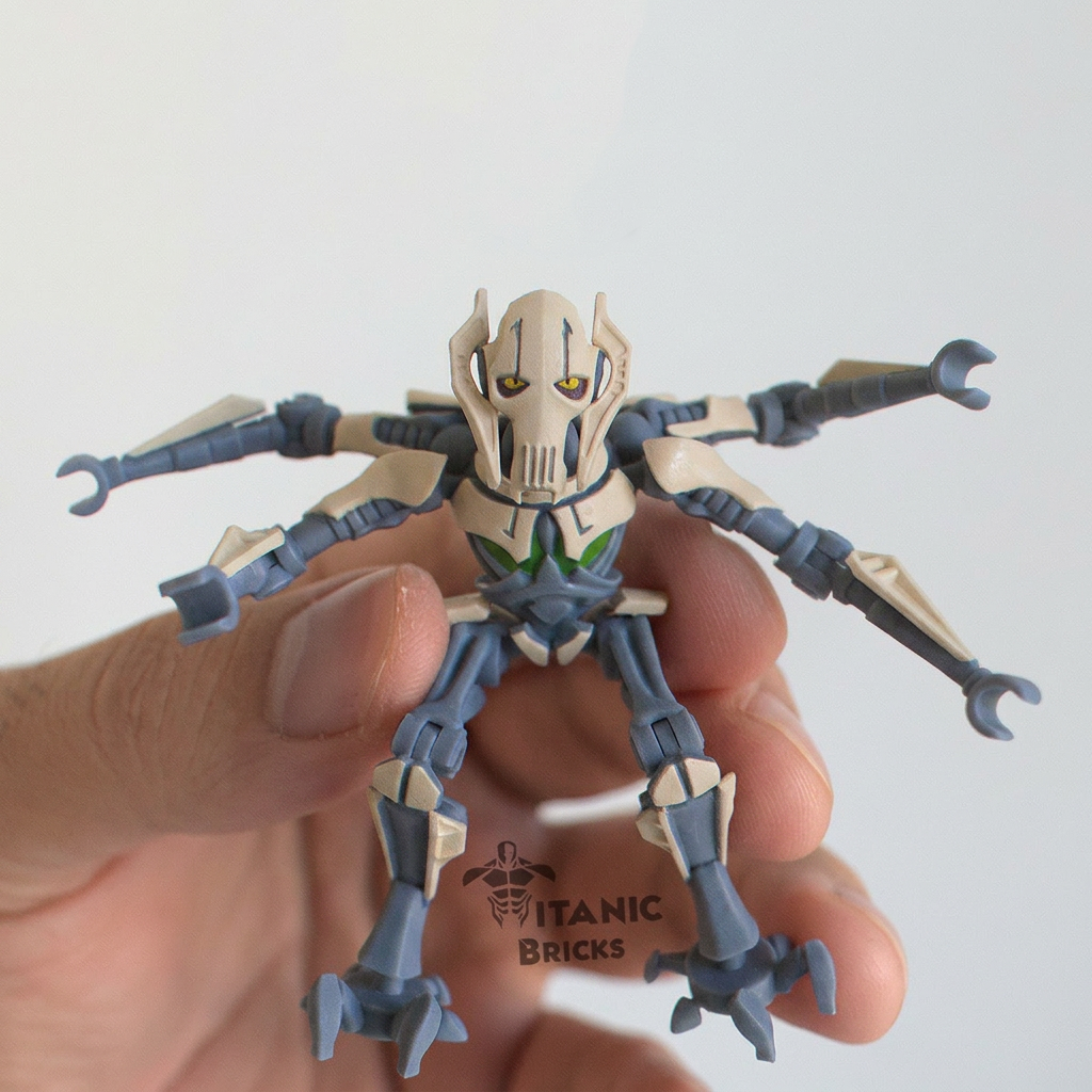 general grievous lego figure held in hand